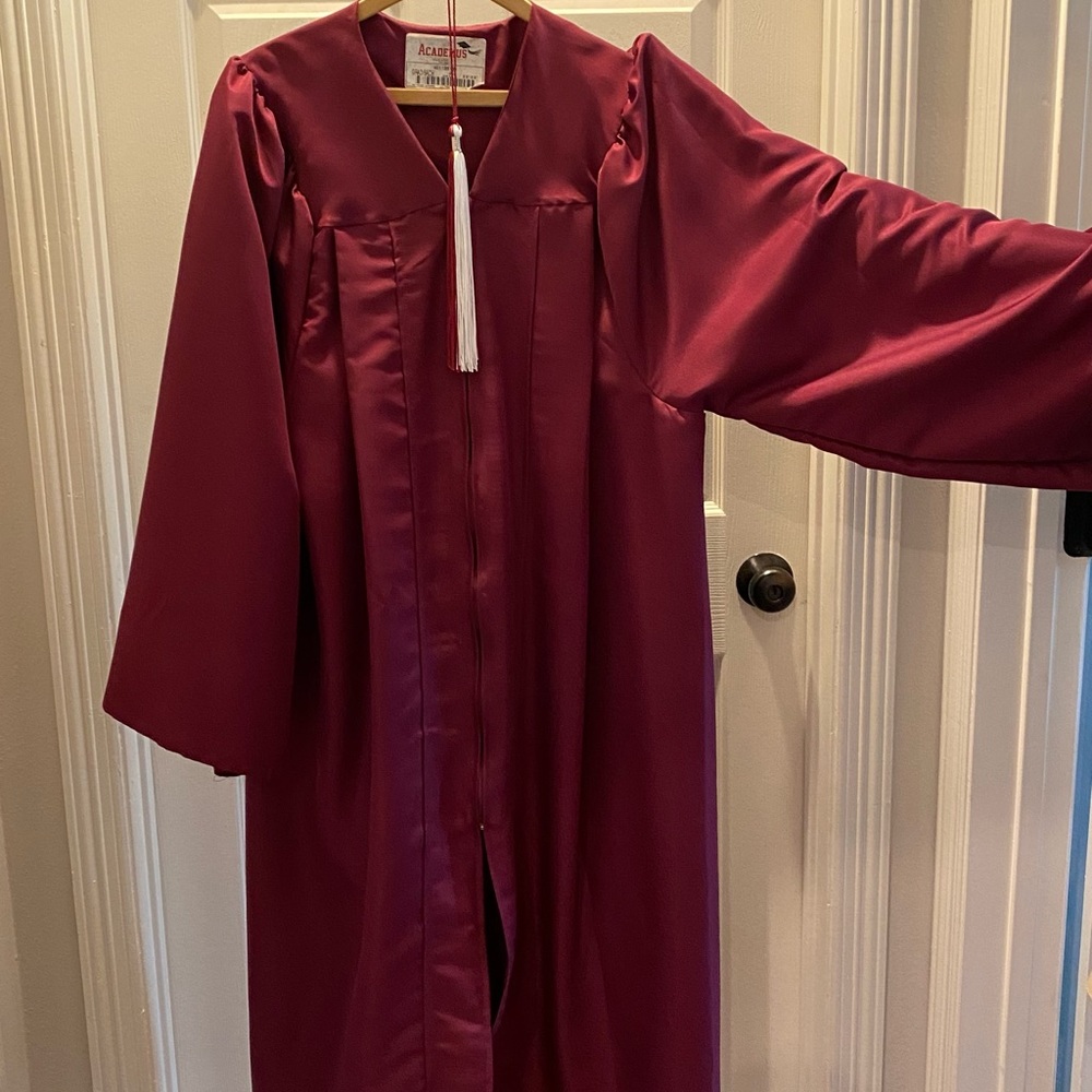 Maroon graduation gown and tassel
